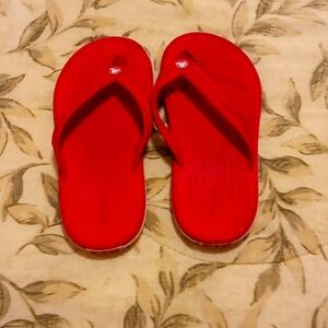 Girl's pink Crocs - size 10